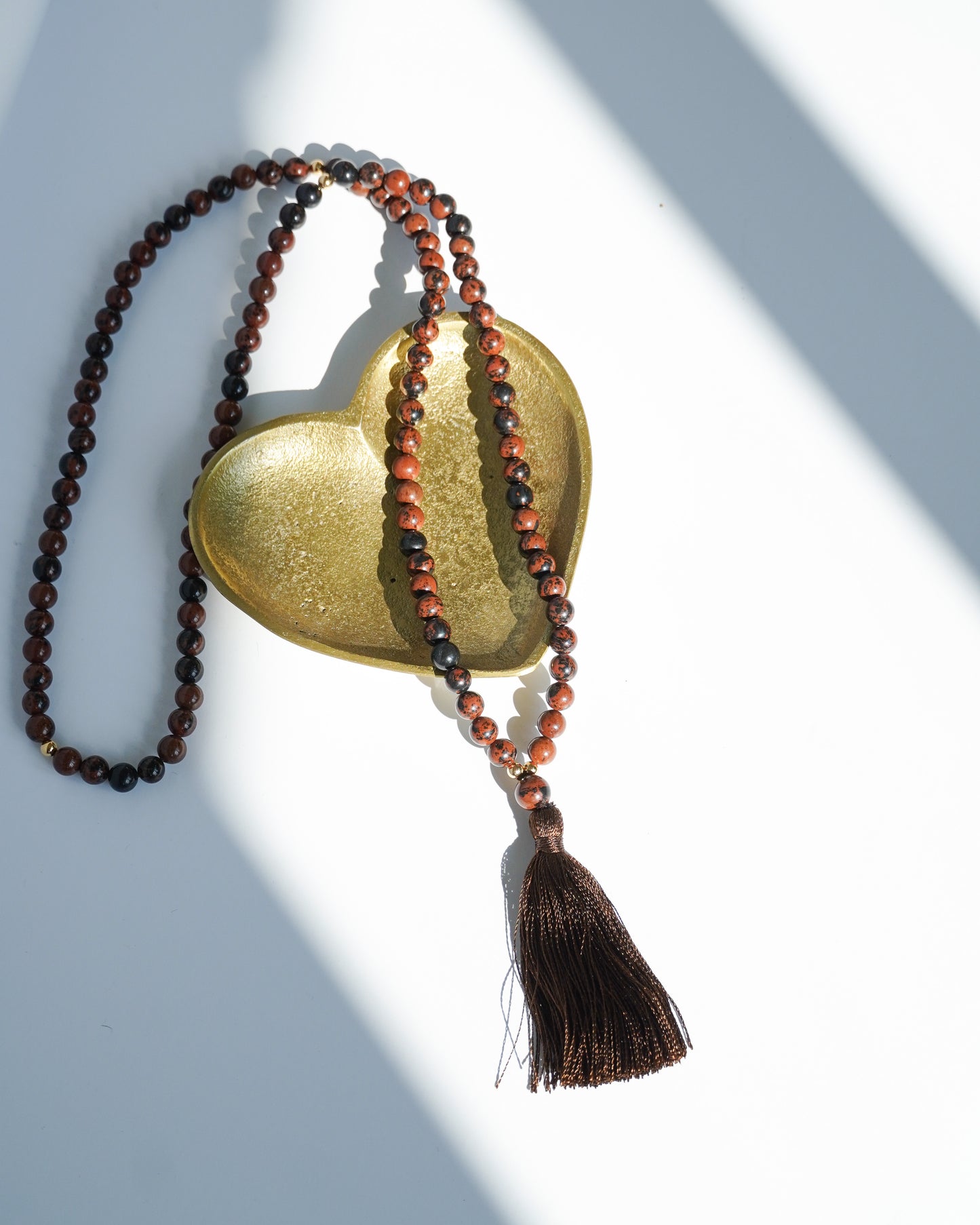 Mala en Obsidienne Mahogany